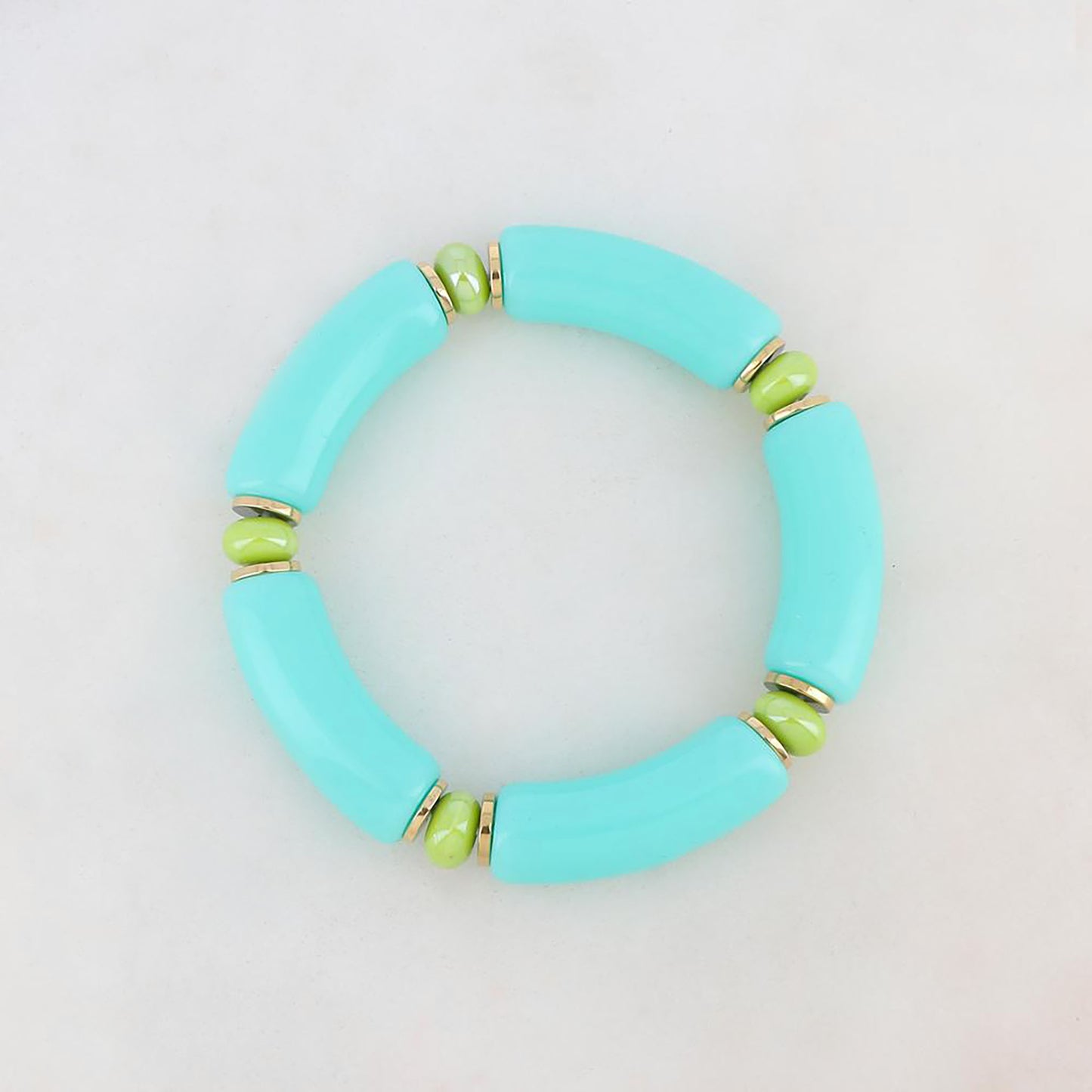 Elastisches Armband mit glänzenden türkisfarbenen und hellgrünen Perlen, französische Marke Ikita.