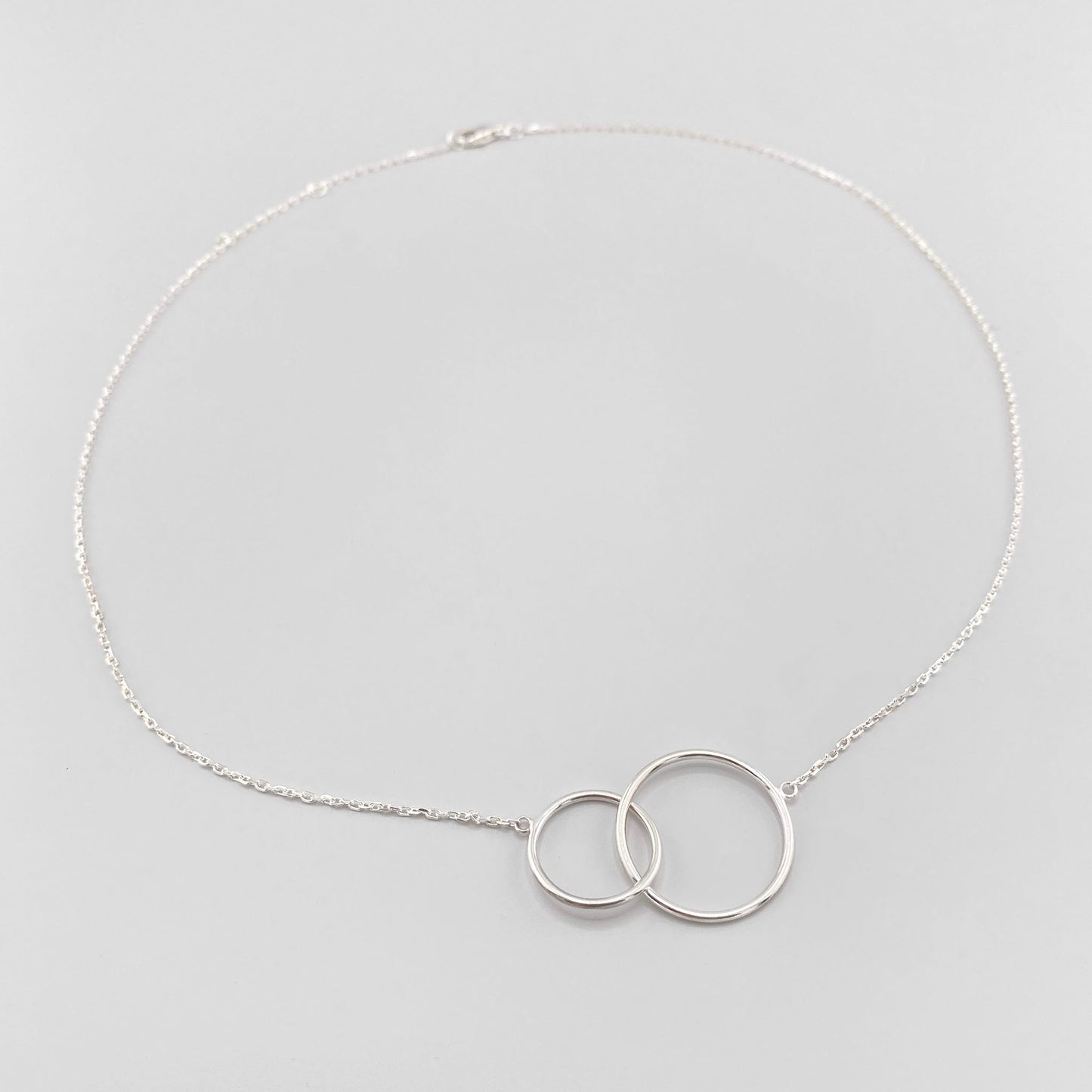 Two silver ring necklace