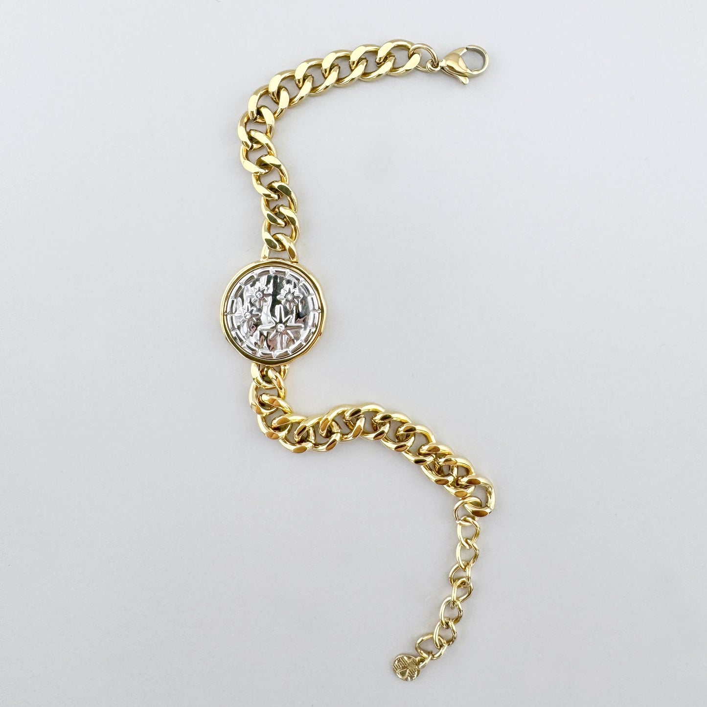 Vergoldetes Edelstahlarmband mit zweifarbigem Medaillon und Sternmotiv, französische Marke Ikita.