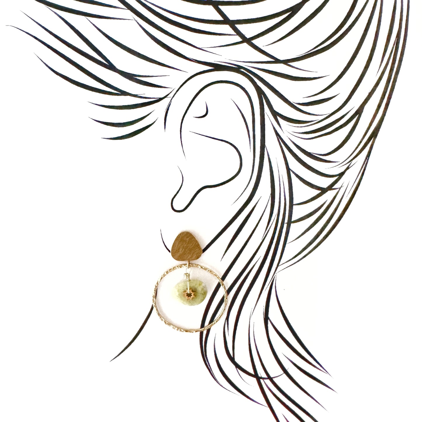 Earrings with hammered hoops and yellow jade pendant, adorned with a gold star-shaped detail, French brand Ikita.