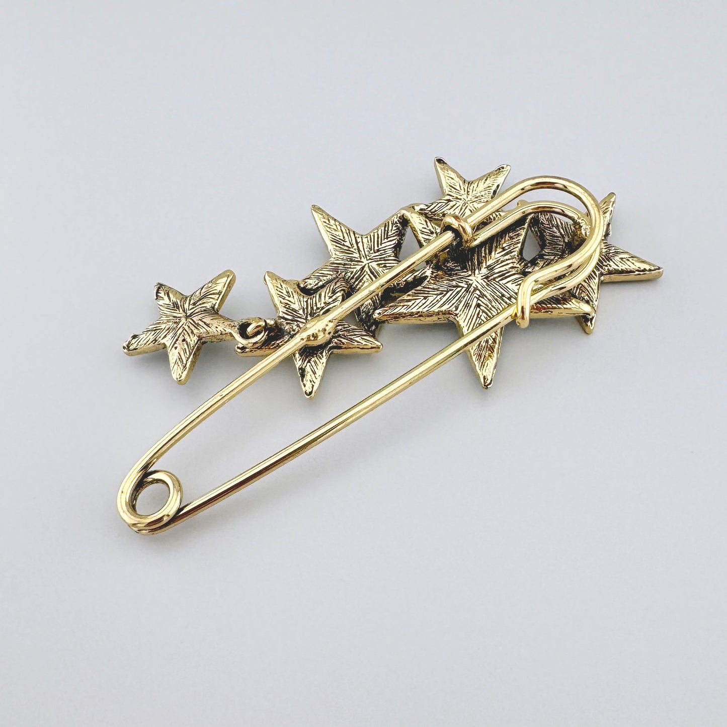 Stars brooch