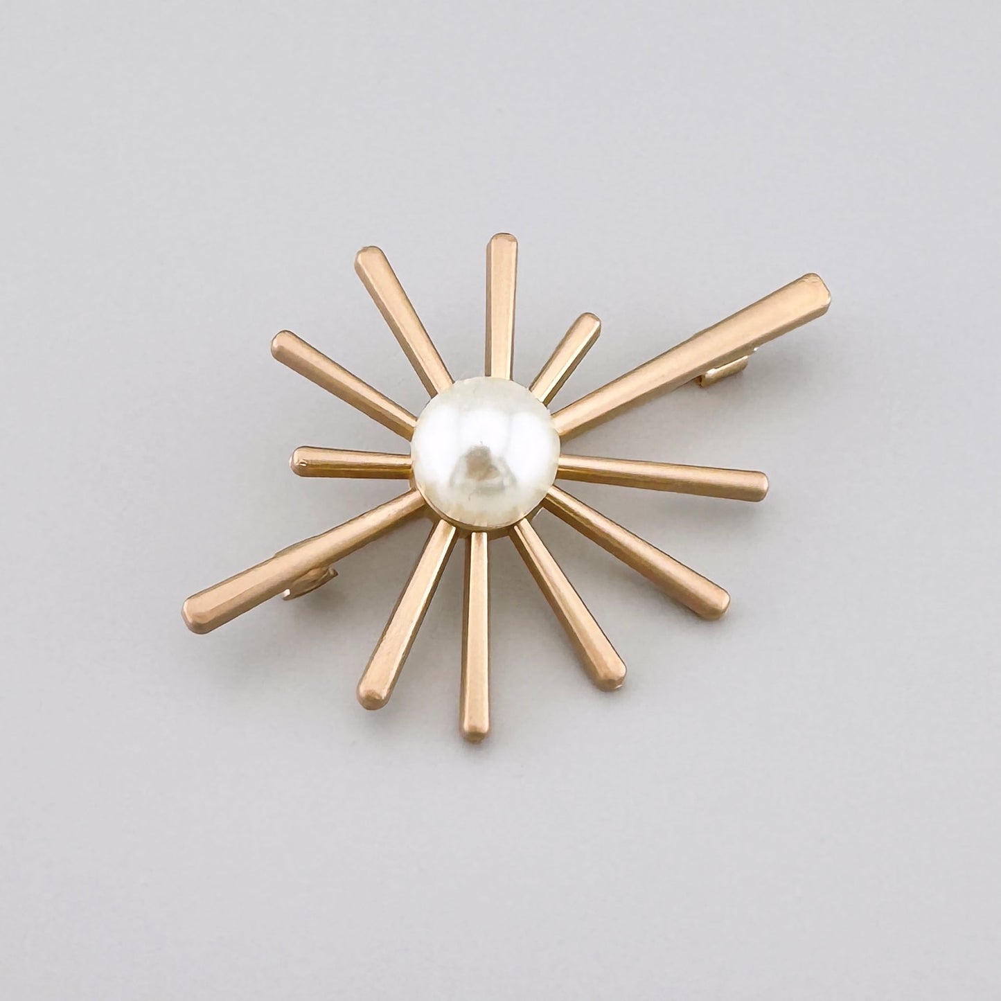 sun brooch