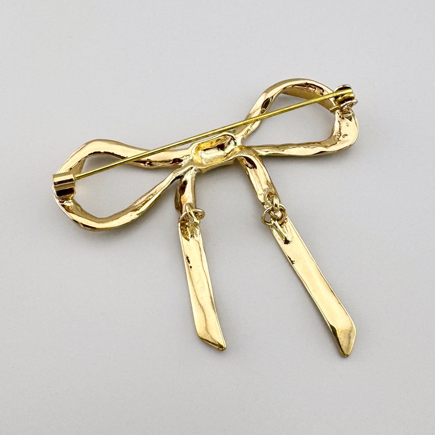 Broche de arco