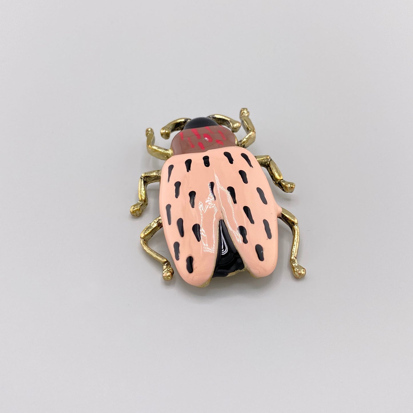 brooch insect
