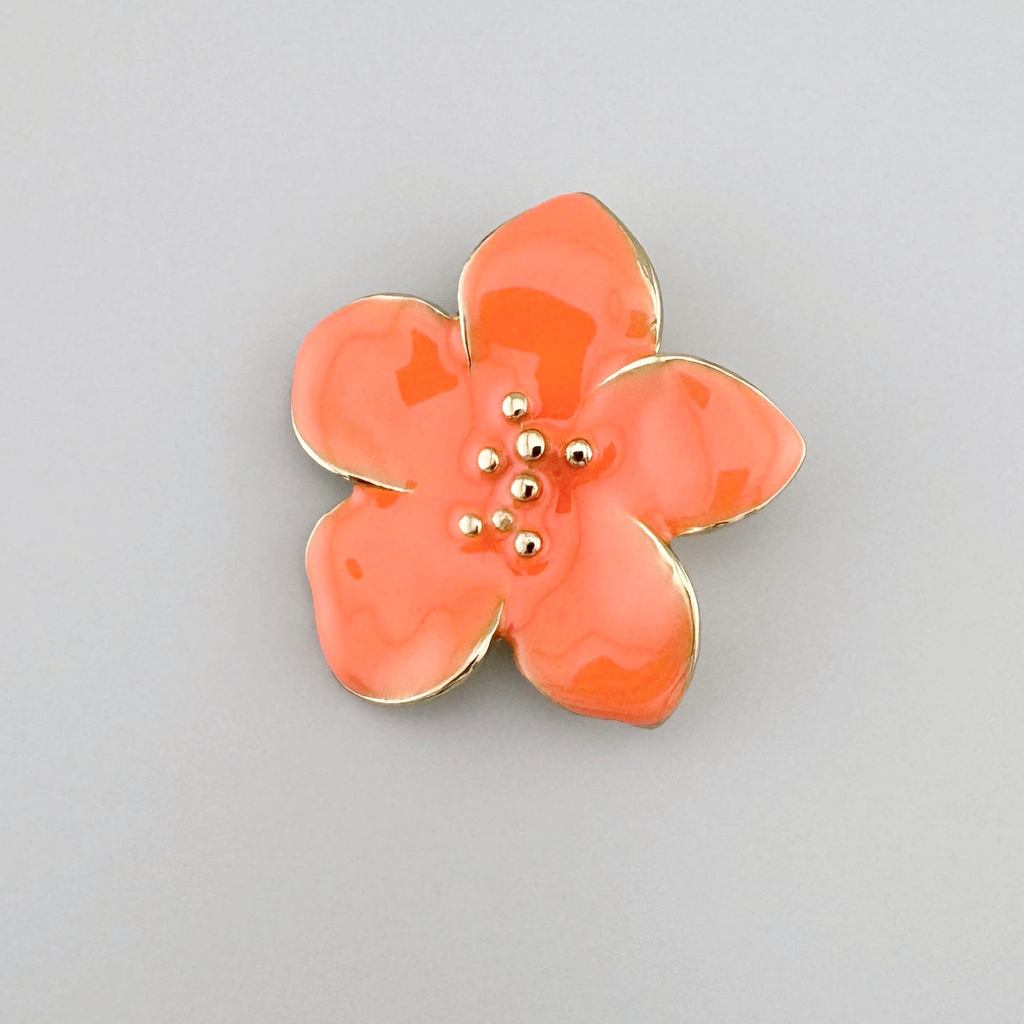 Orange flower-shaped brooch with gold finish, Spanish brand Sonata.