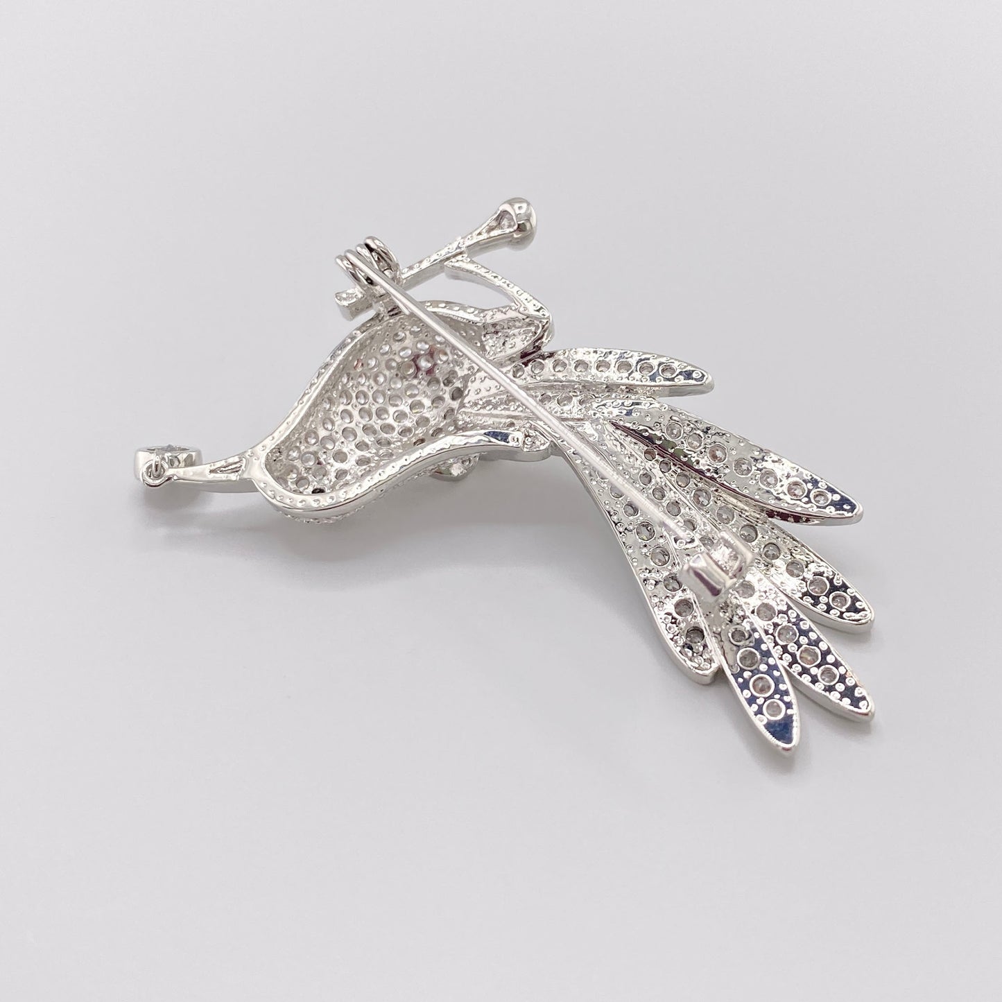 Брошь птица