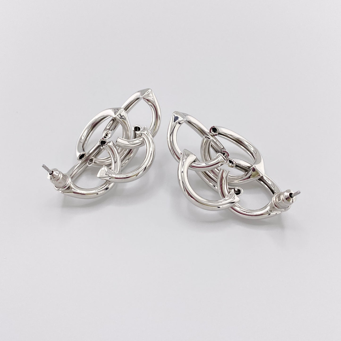 плетені сережки