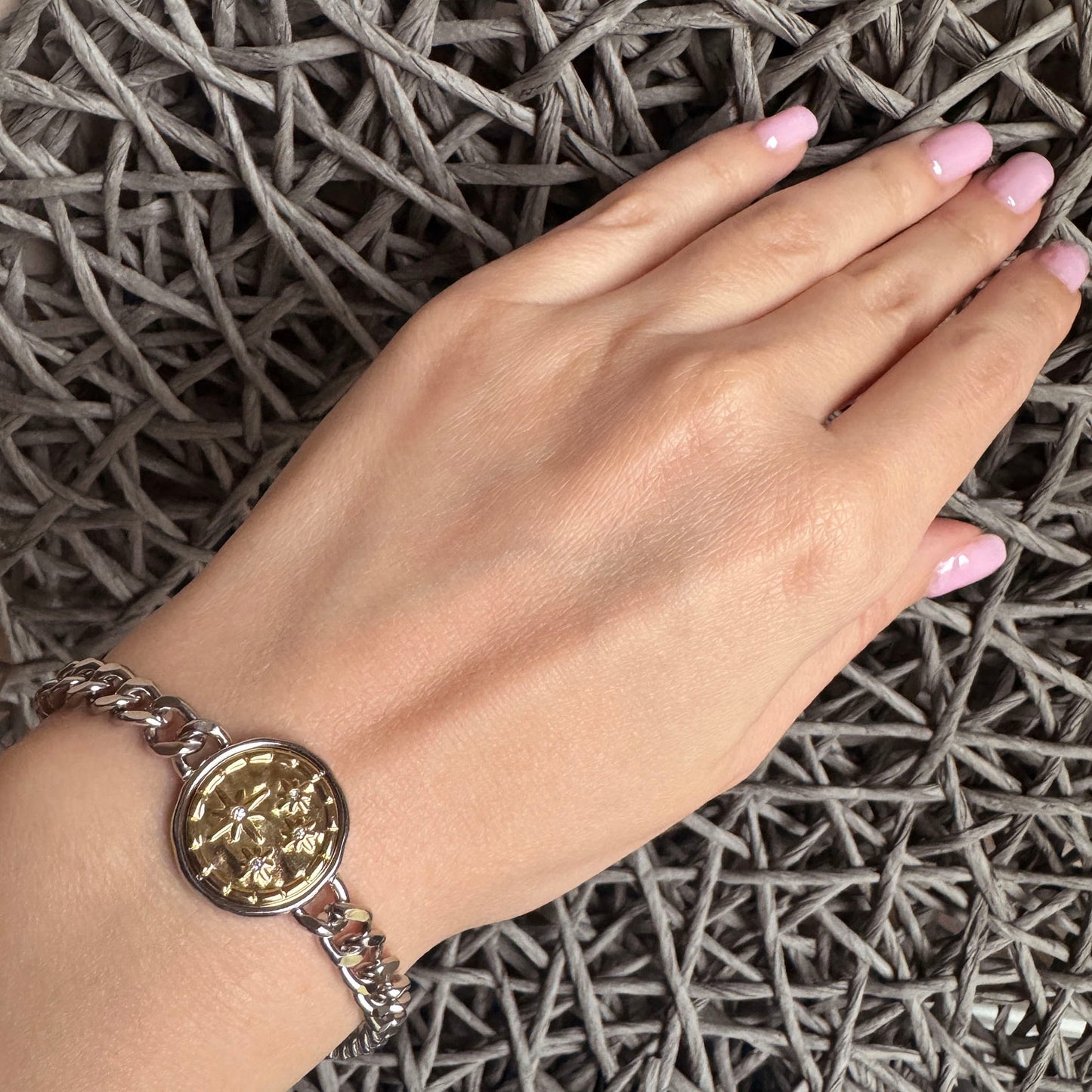 Chain bracelet in stainless steel with silver-gold medallion and star engraving, French brand Ikita.