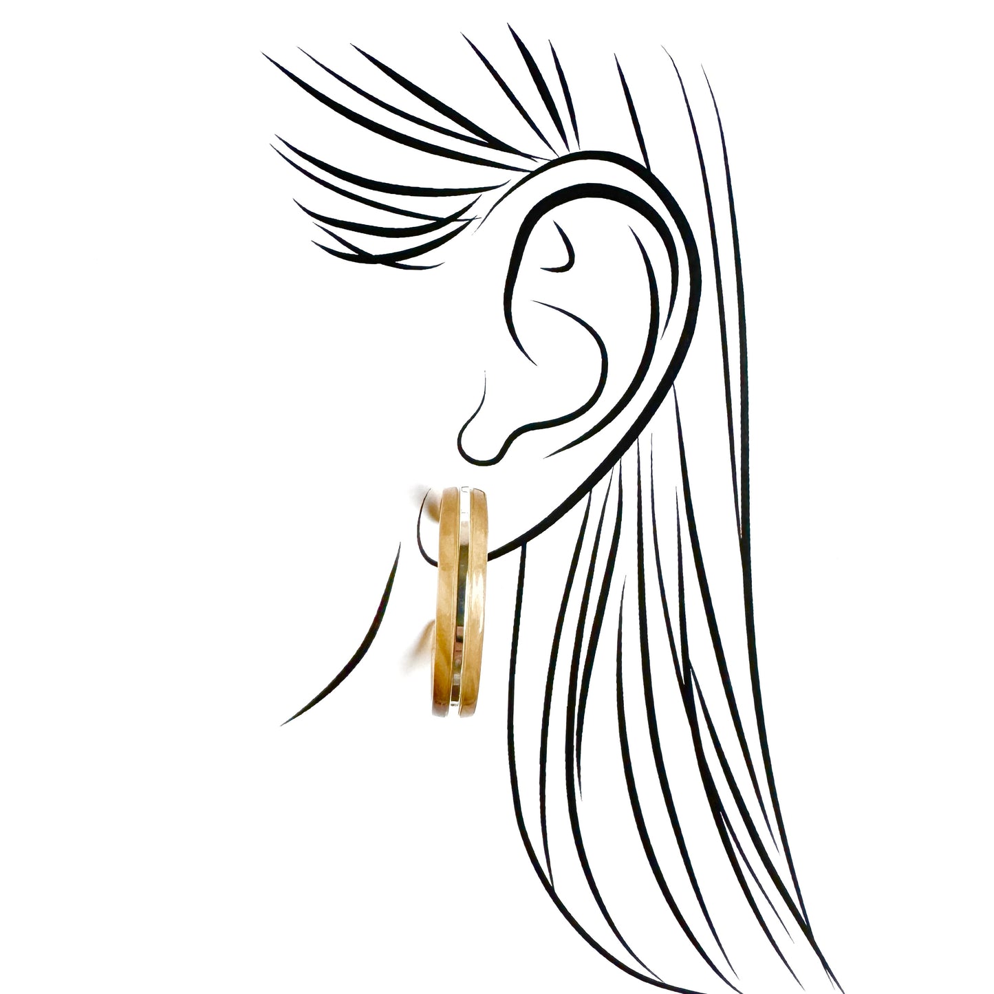 Hoop earrings in honey amber tone with metallic finish, Danish brand Pilgrim.
