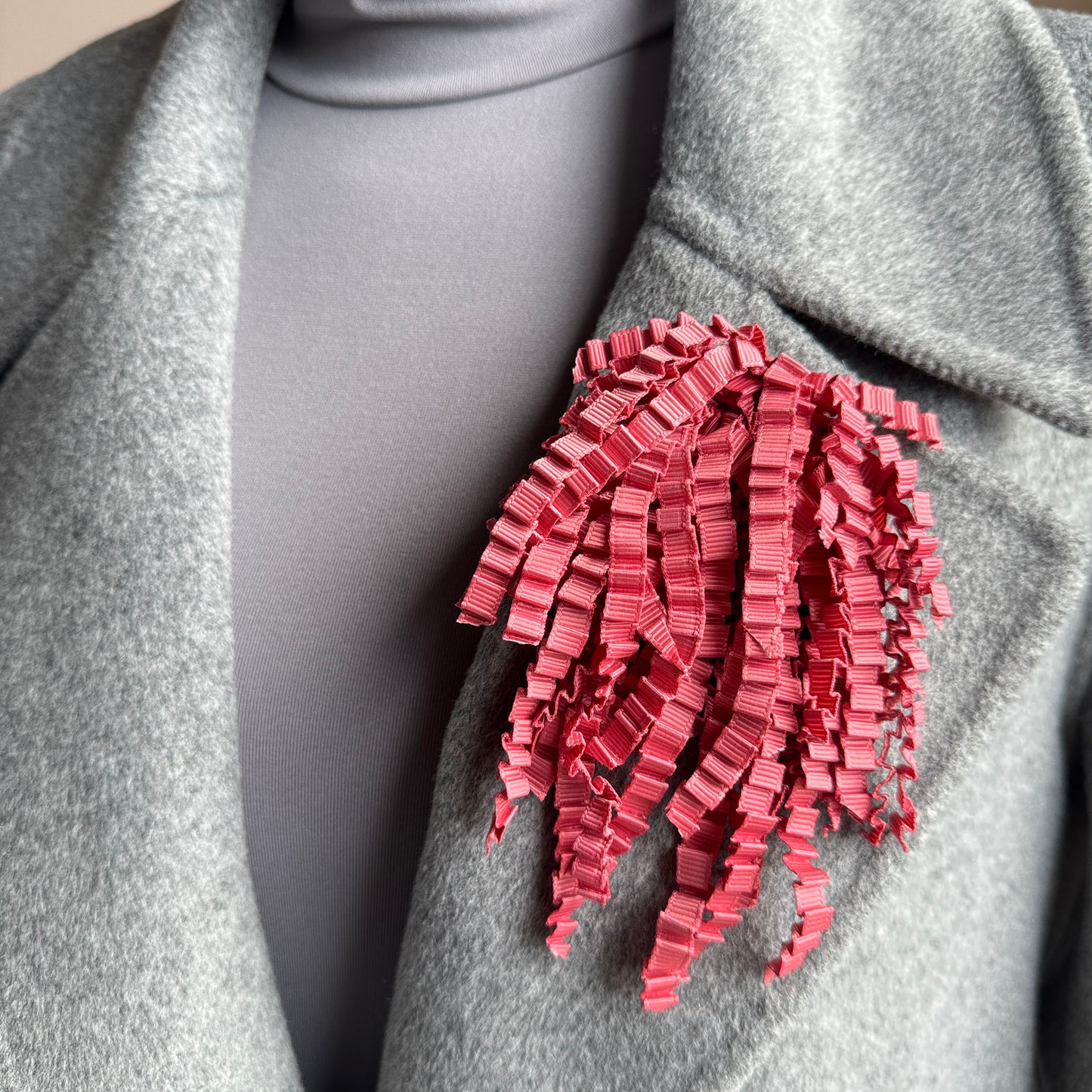 Brooch made of pink twisted ribbons with a three-dimensional structure, Spanish brand Sonata.