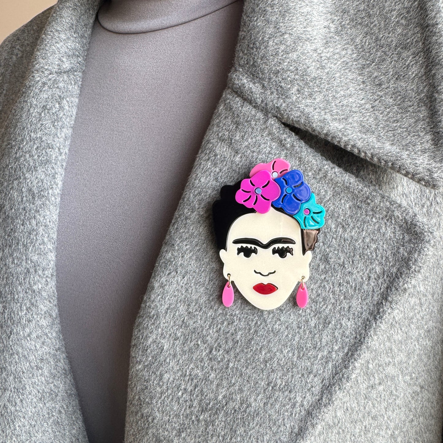 Frida Kahlo brooch with colorful flowers and earrings, Spanish brand Sonata.