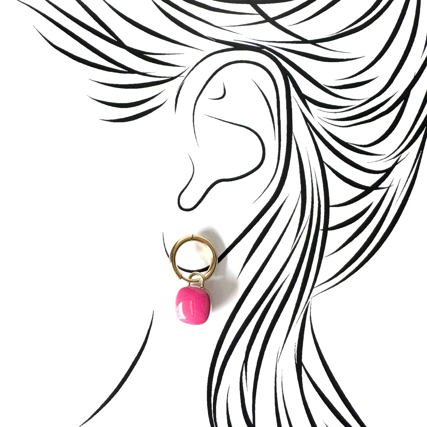 Gold hoop earrings with glossy pink enamel charms, French brand Cannelle.