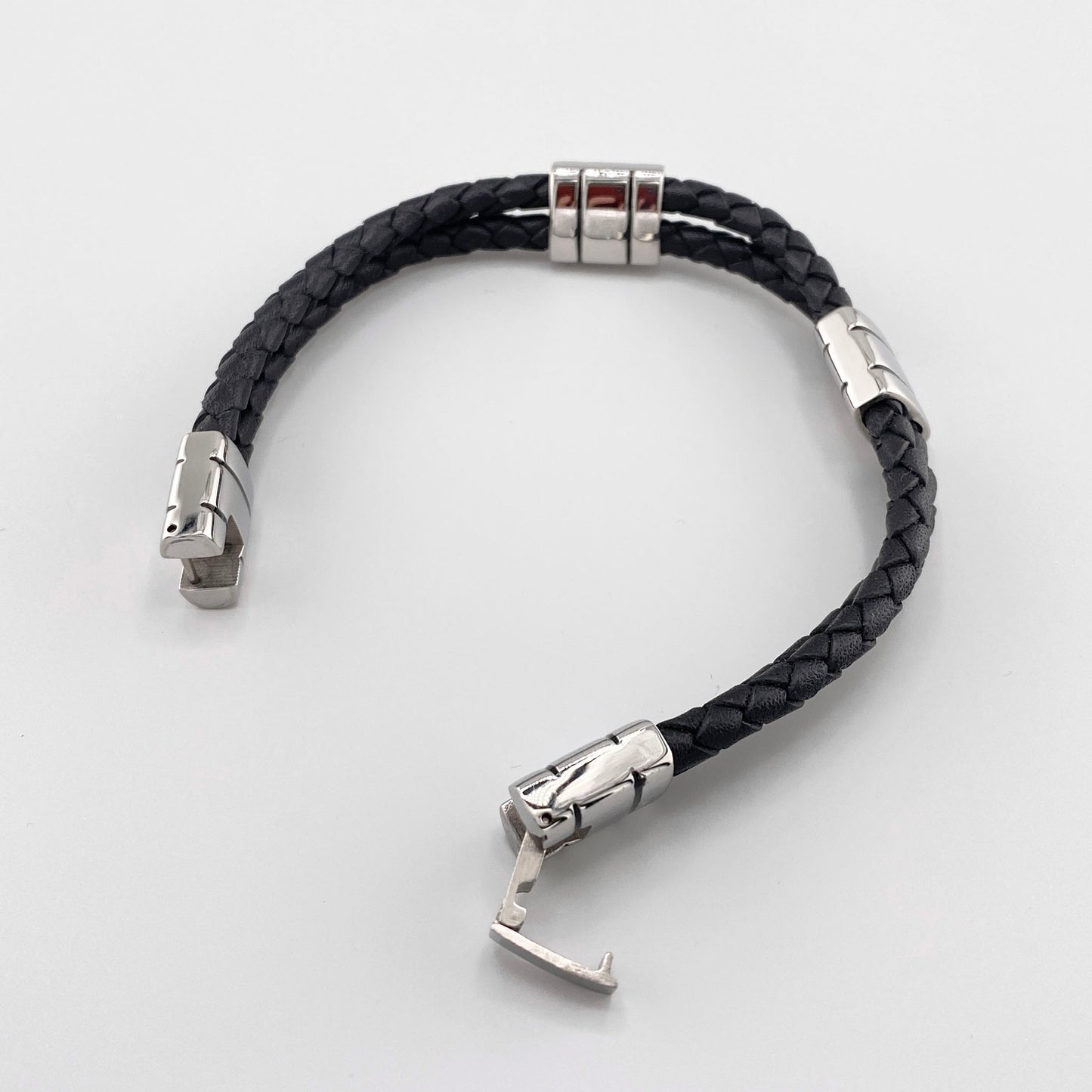 Men's bracelet made of braided black leather with silver-tone stainless steel elements, French brand IRL.