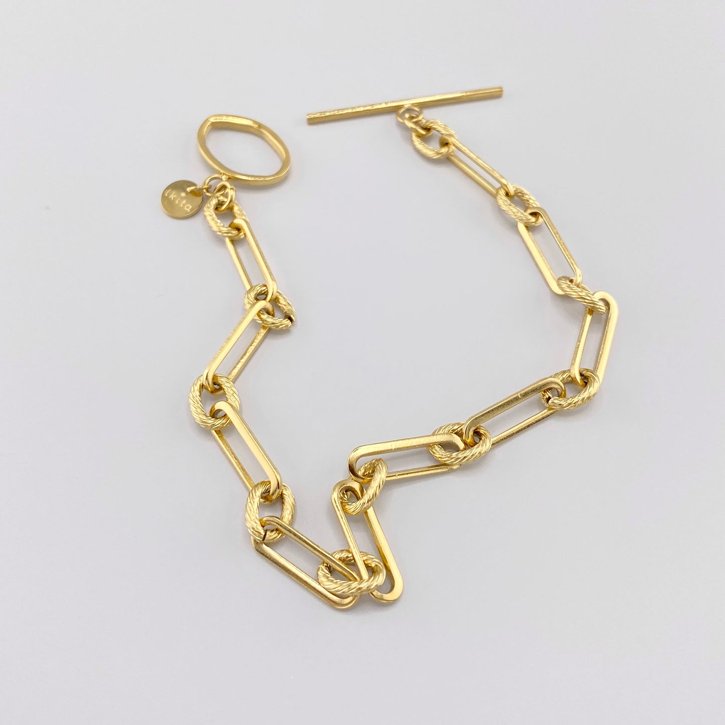 Chain bracelet with elongated and round links, French brand Ikita.