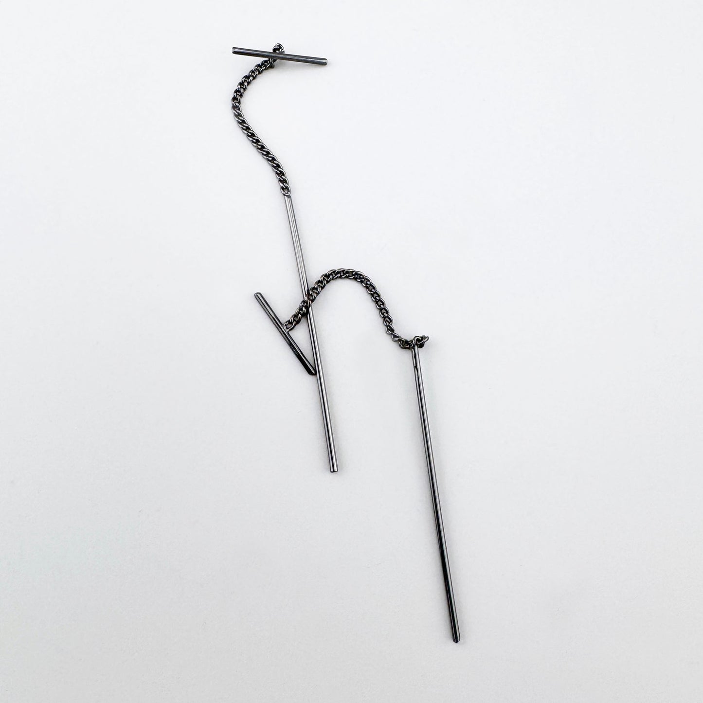 Boucles longues en chaîne anthracite avec tige droite raffinée