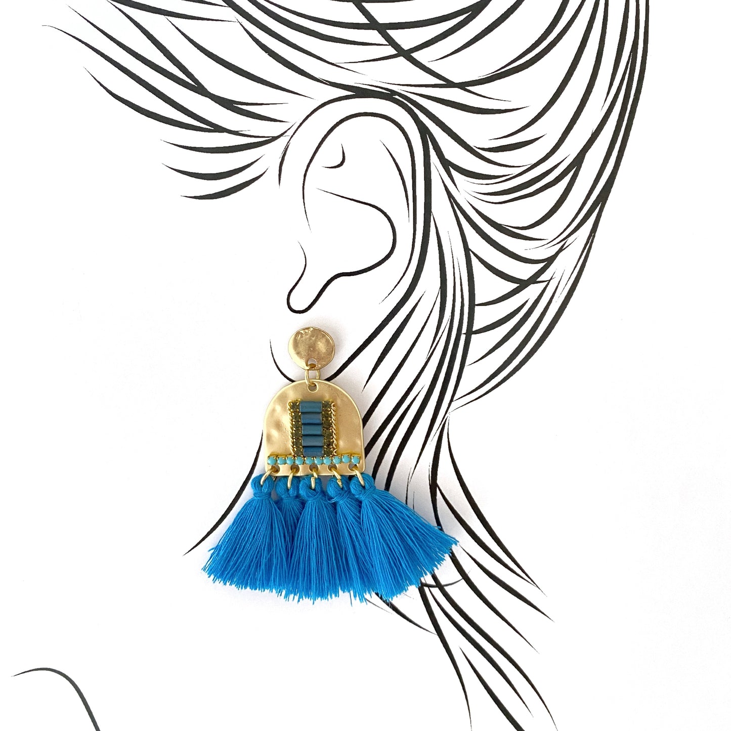 Blue tassel earrings with gold base and ethnic detailing