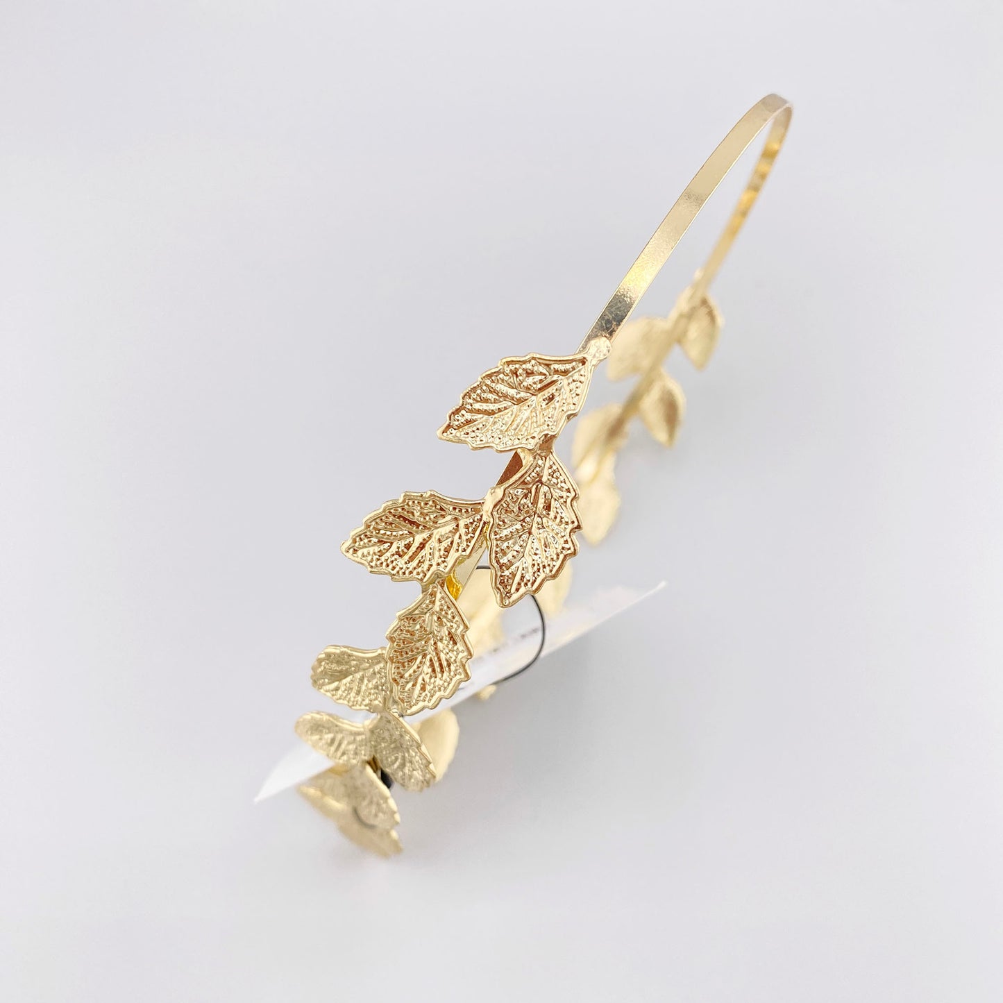 Gold headband with matte and glossy leaves for bridal and evening looks