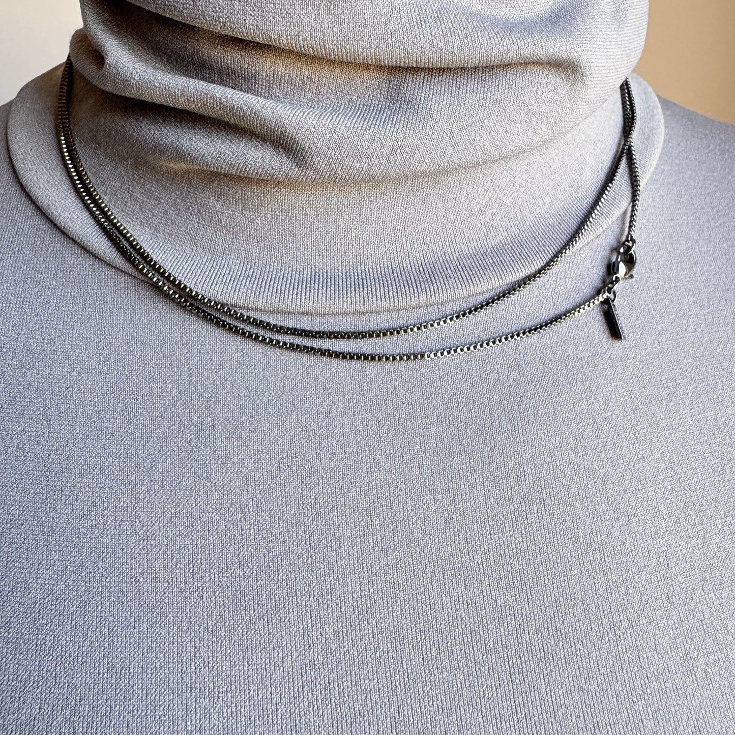 Graphite snake chain necklace with a sleek minimalist design for modern elegance