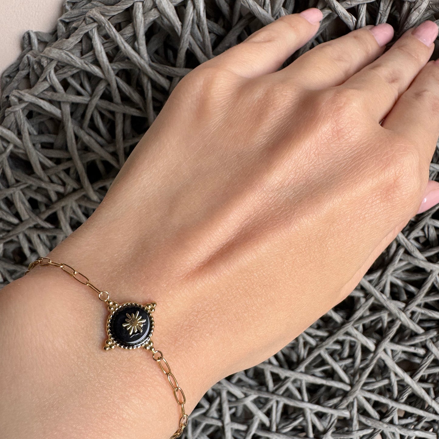 Delicate gold bracelet with engraved medallion and vintage chain