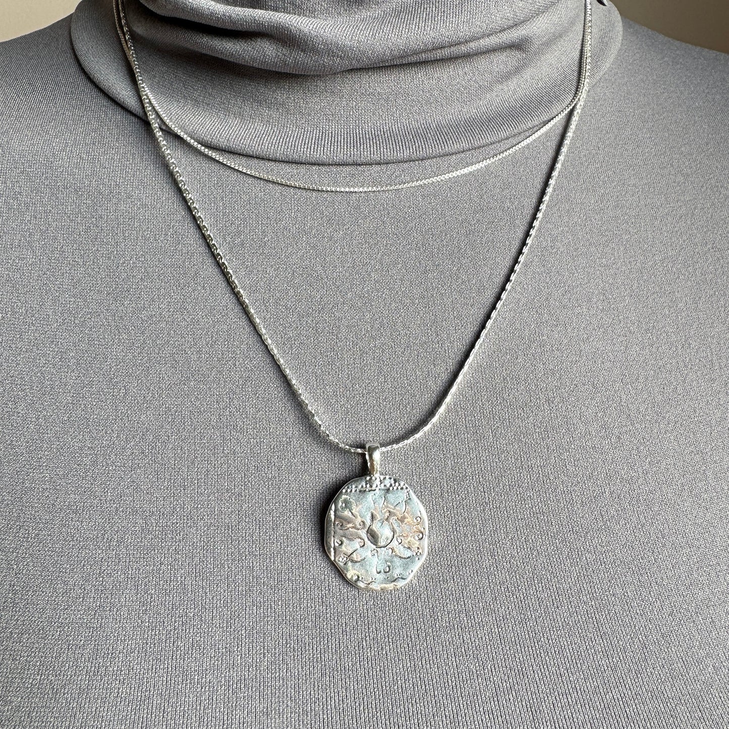Pilgrim silver necklace with engraved round medallion and adjustable chain