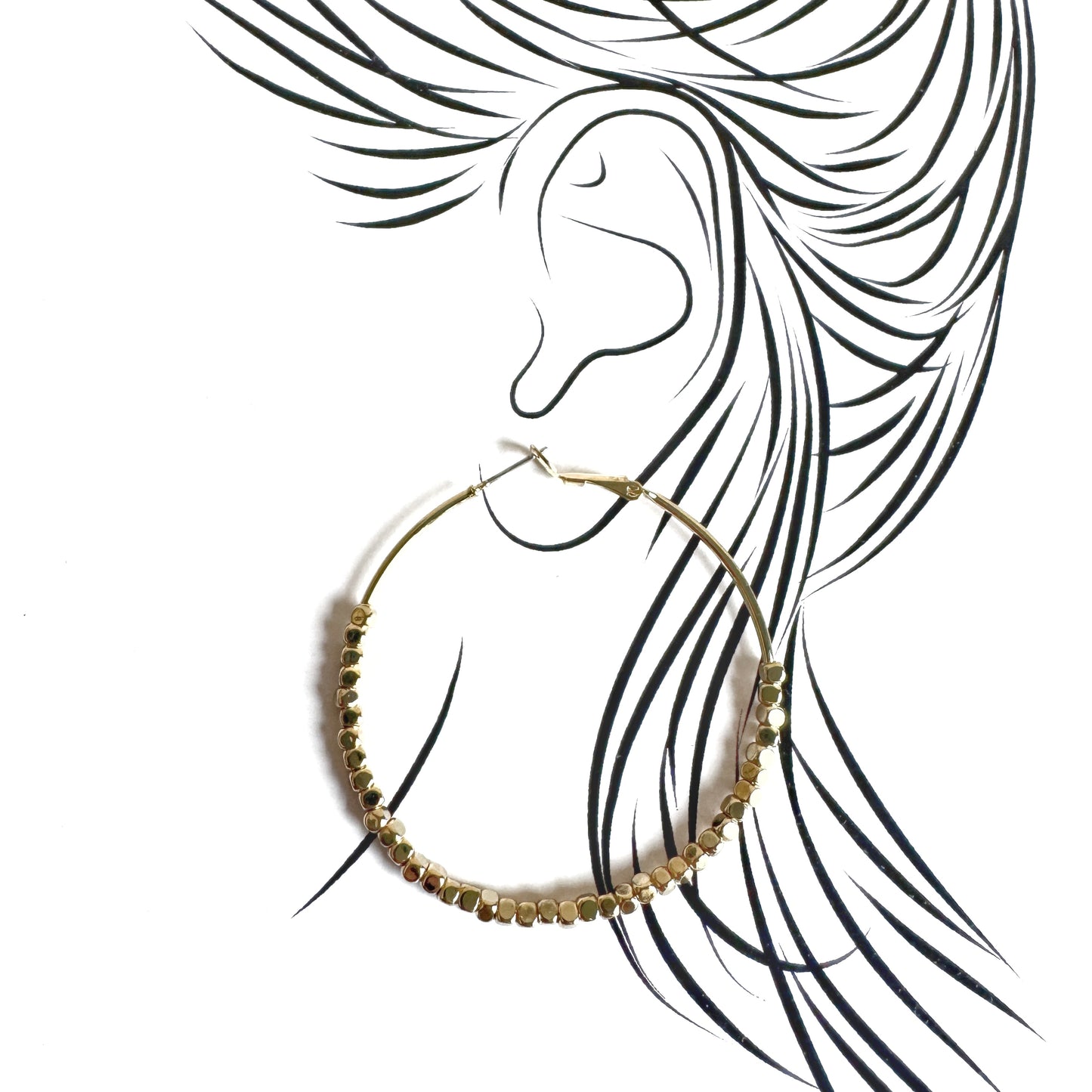 Gold hoops with delicate faceted elements drawn in elegant outline style