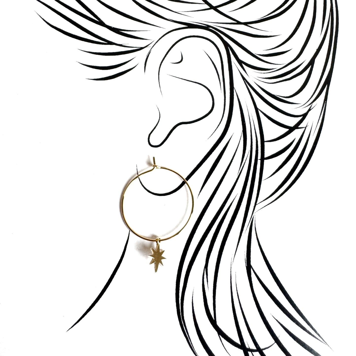 Gold hoop earrings with delicate star charm and polished surface shine