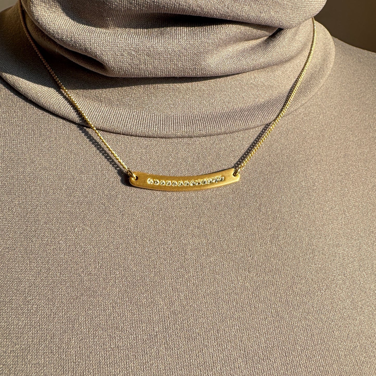 Gold plated Pilgrim necklace with rectangular pendant and sparkling crystals