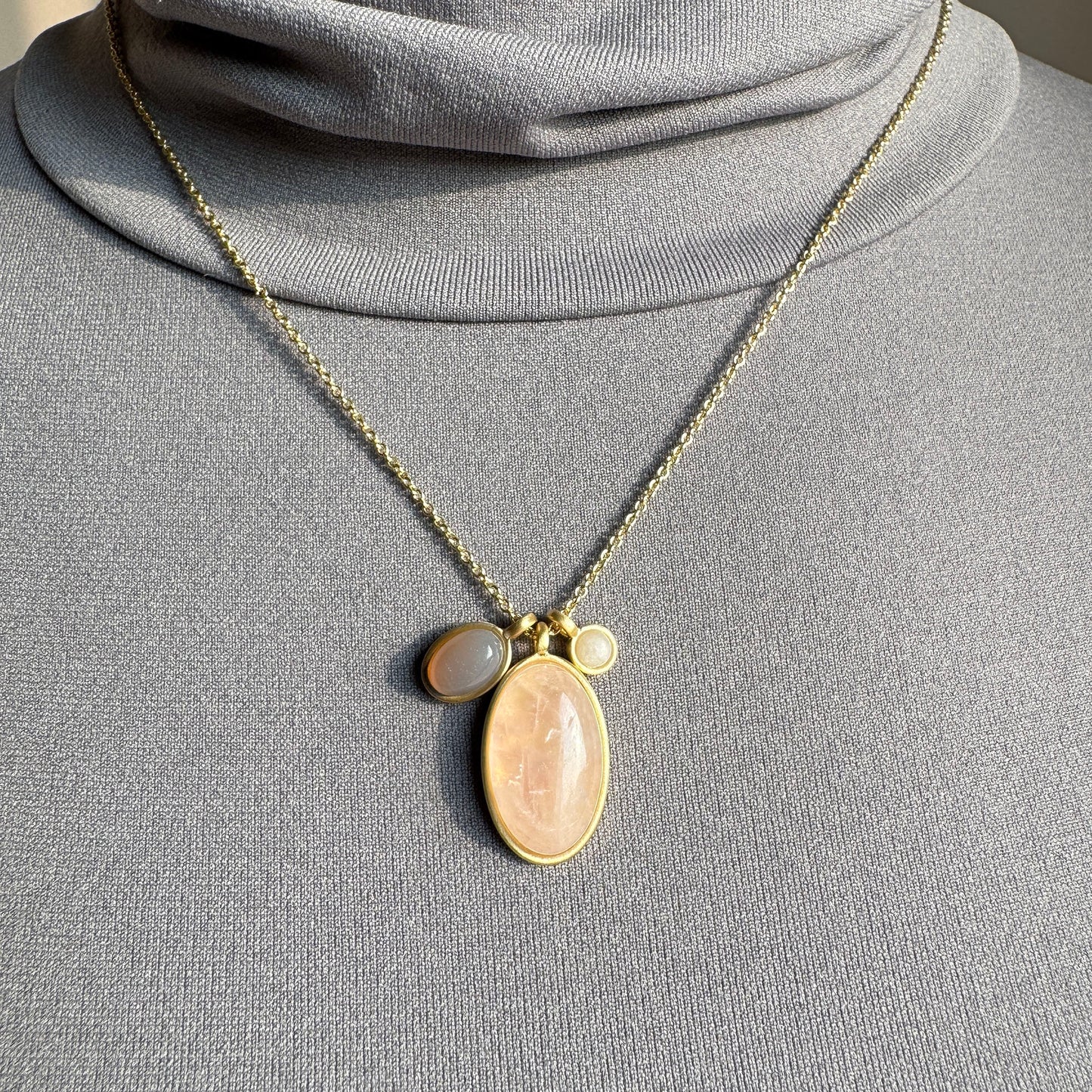 Gold Pilgrim necklace with rose quartz, white jade and gray quartz in a matte finish
