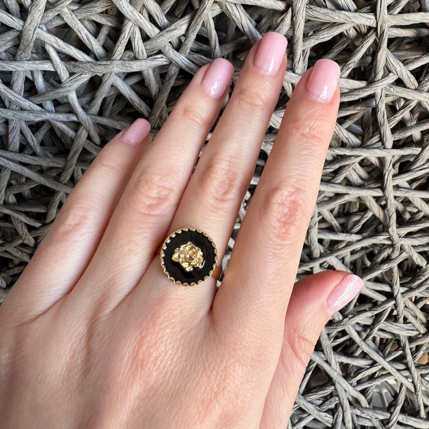 Gold plated IRL ring with delicate rose on black enamel in art deco style