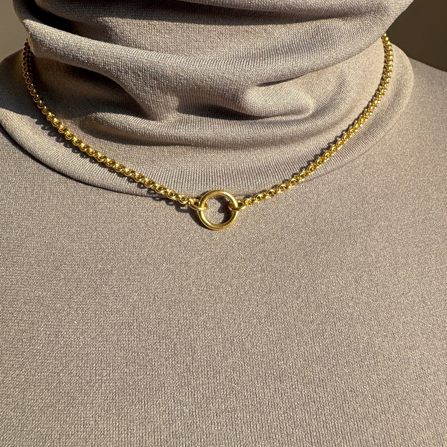 Elegant Pilgrim necklace with a delicate circle pendant in gold finish