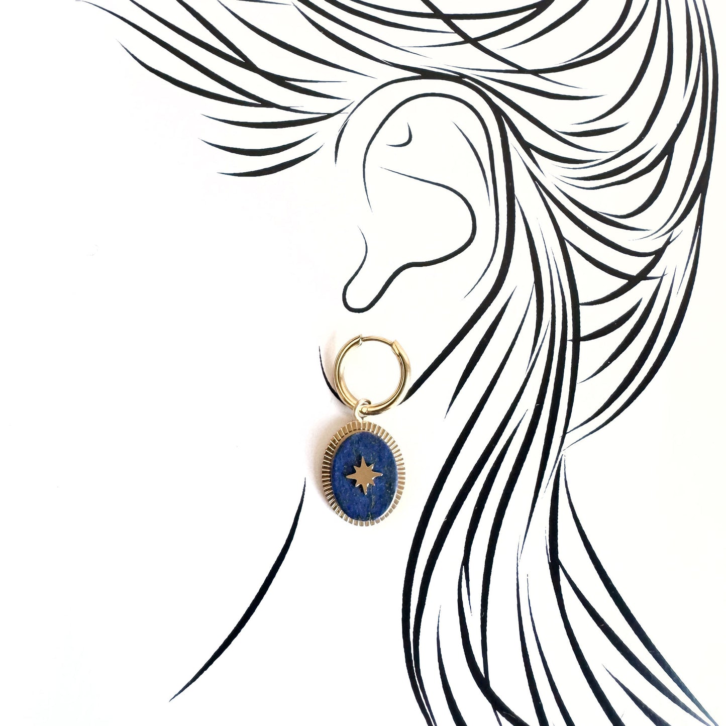 Asymmetrical gold earrings with blue lapis lazuli pendant on one side