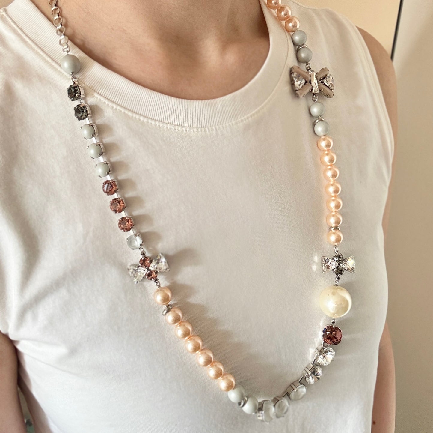 Elegant long necklace with pastel pearls and sparkling crystals