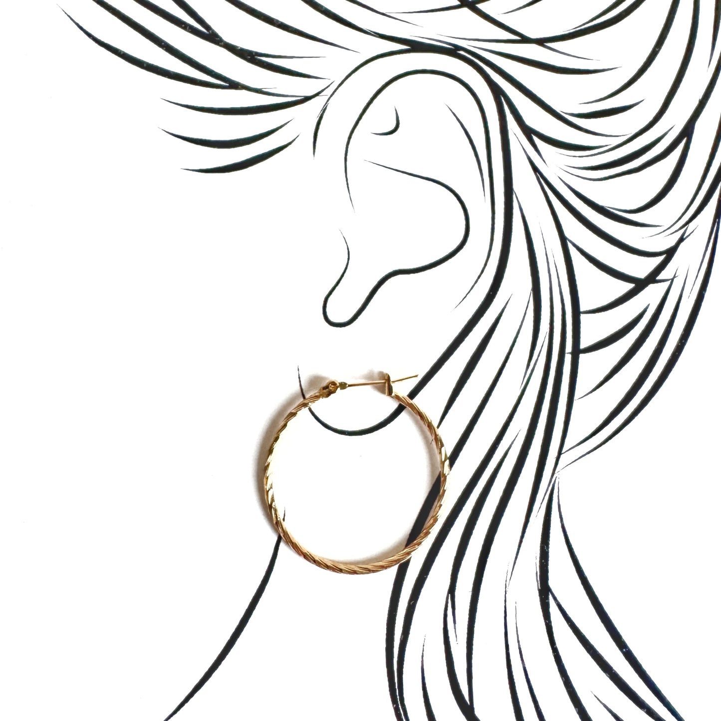 Medium gold hoops with twisted groove design and hinged clasp