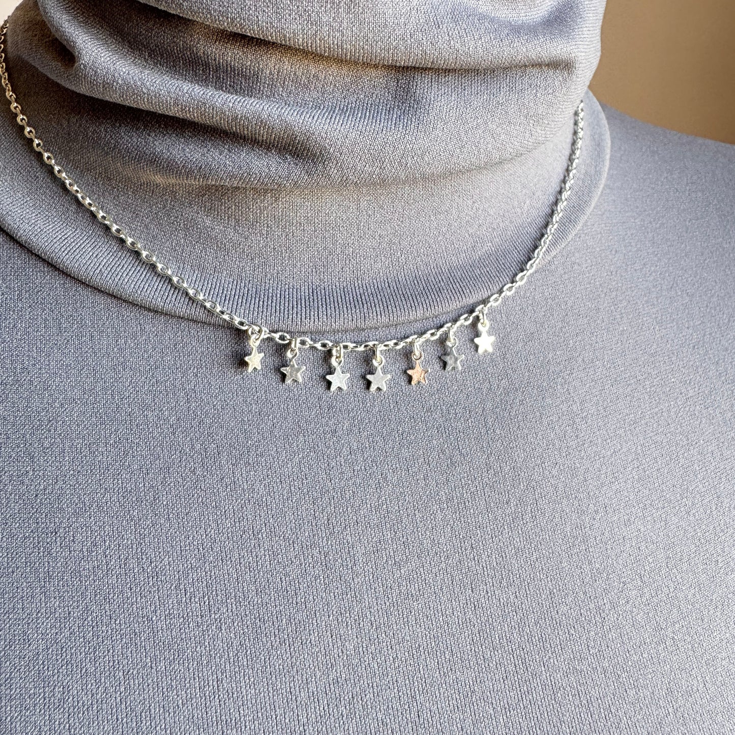 Pilgrim necklace with small star charms on silver-plated chain