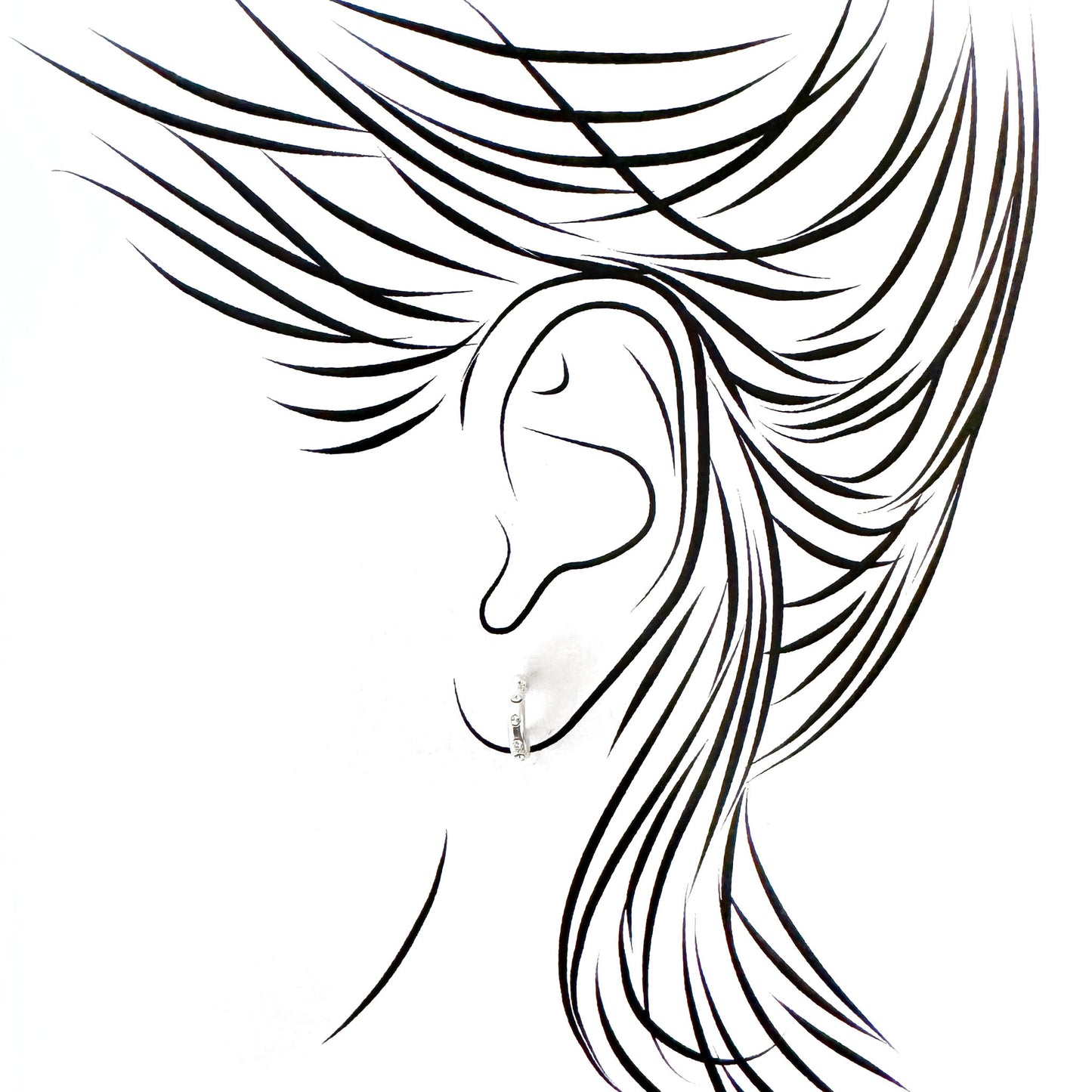 Silver zircon stud hoops displayed on illustrated ear