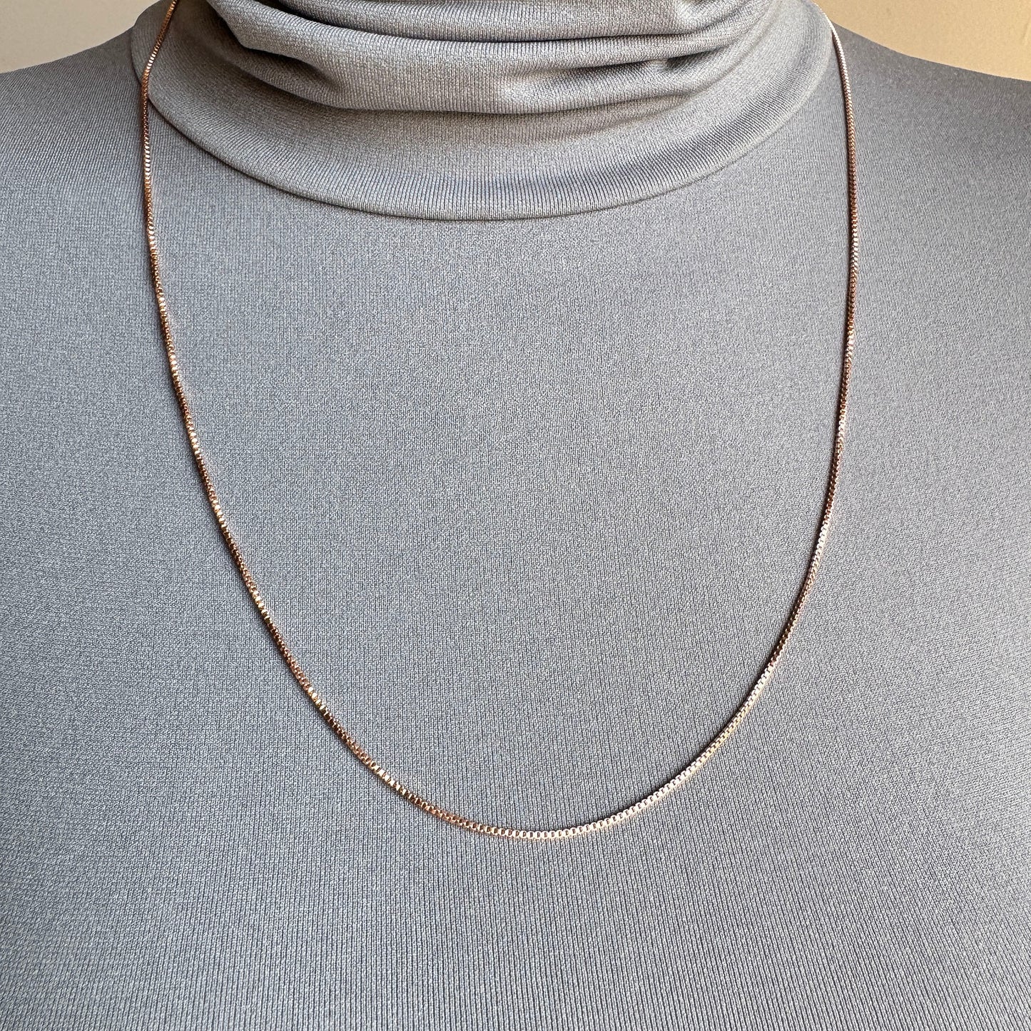 Rose gold minimalist chain Pilgrim draped softly on the neck