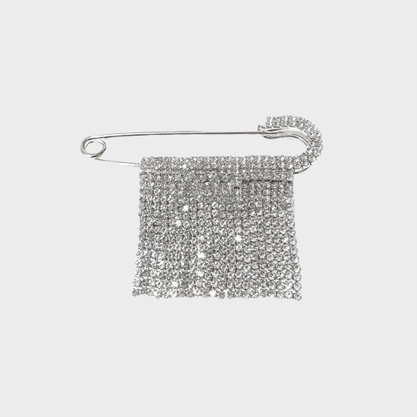 Brooch with zircons in silver colour