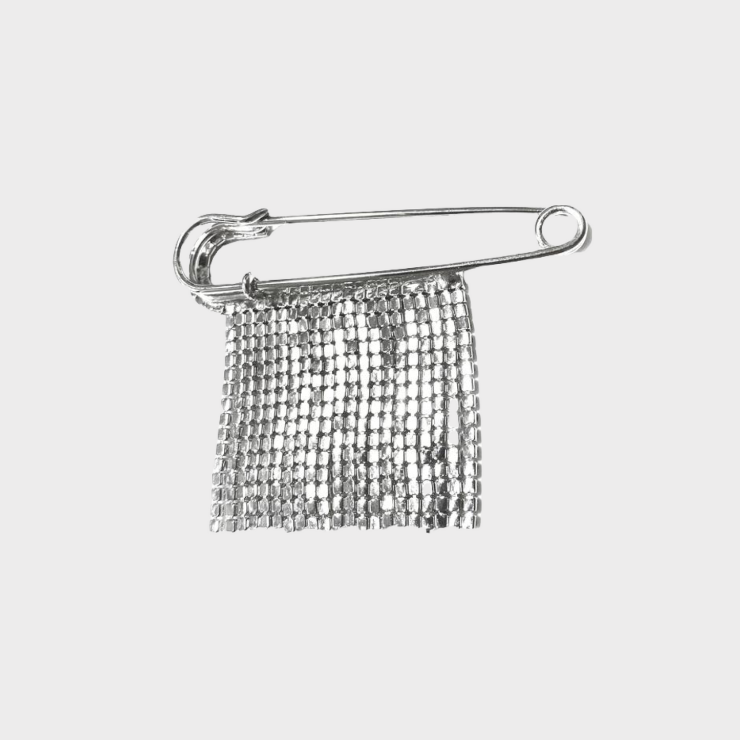 Brooch with zircons in silver colour