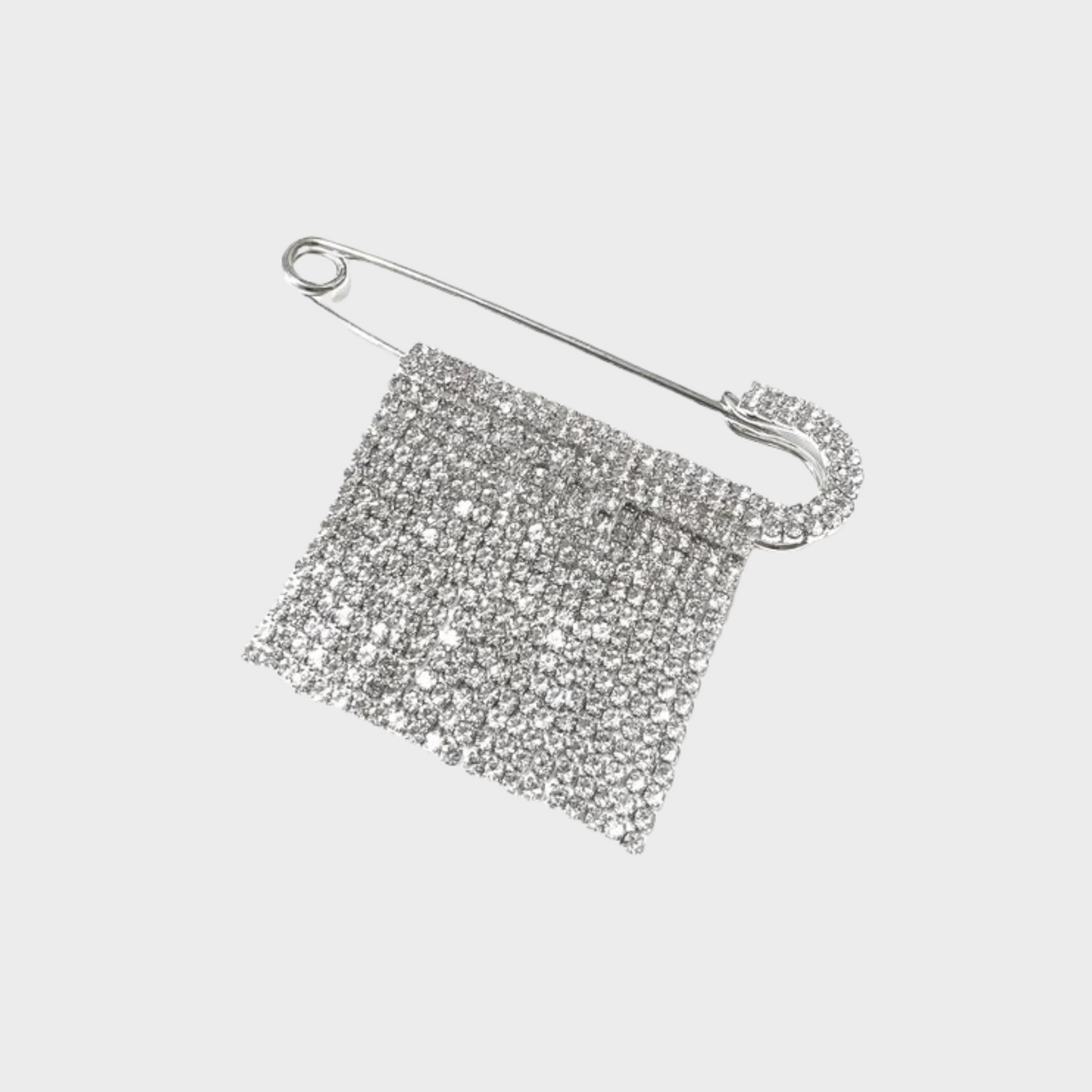 Brooch with zircons in silver colour