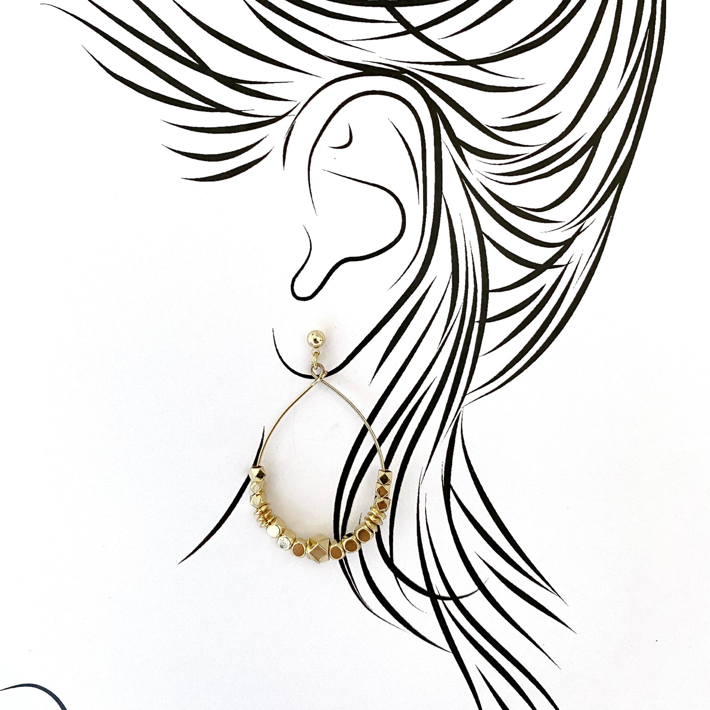 Gold drop earrings with polished faceted and smooth elements