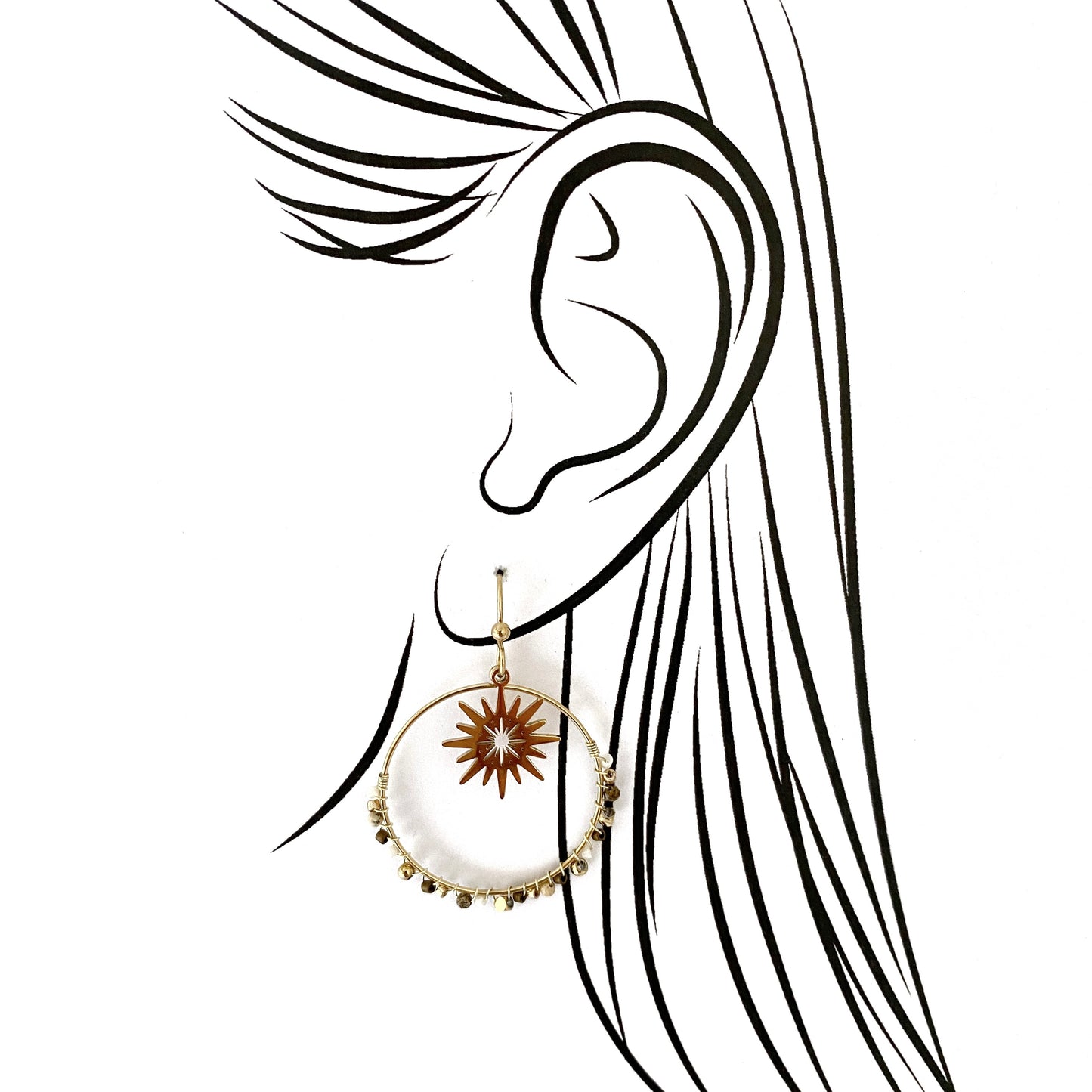 Gold hoop earrings IRL with star-shaped charm shown in elegant ear sketch illustration