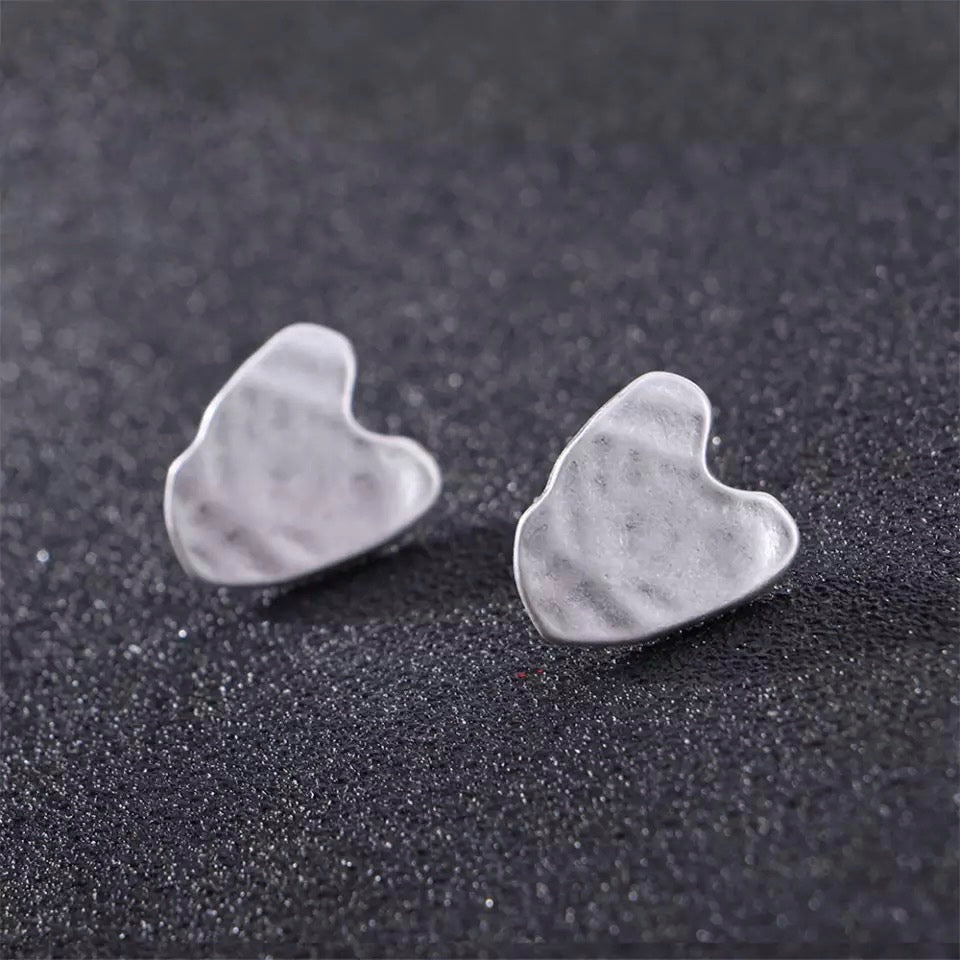 Boucles d’oreilles géométriques en argent au design organique et moderne