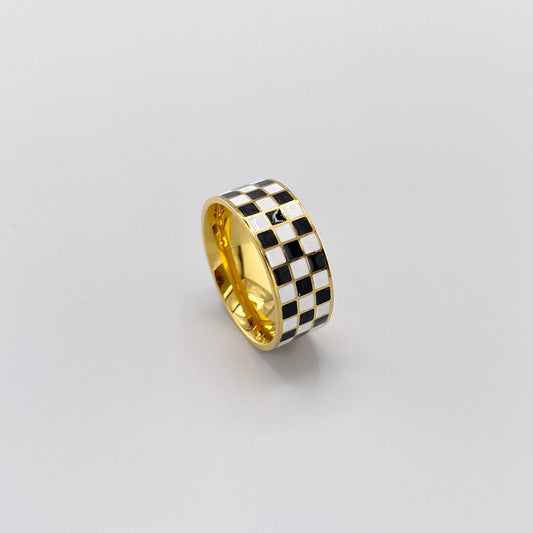 black and white checkered ring