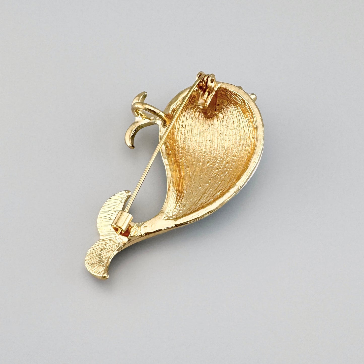 Dolphin brooch