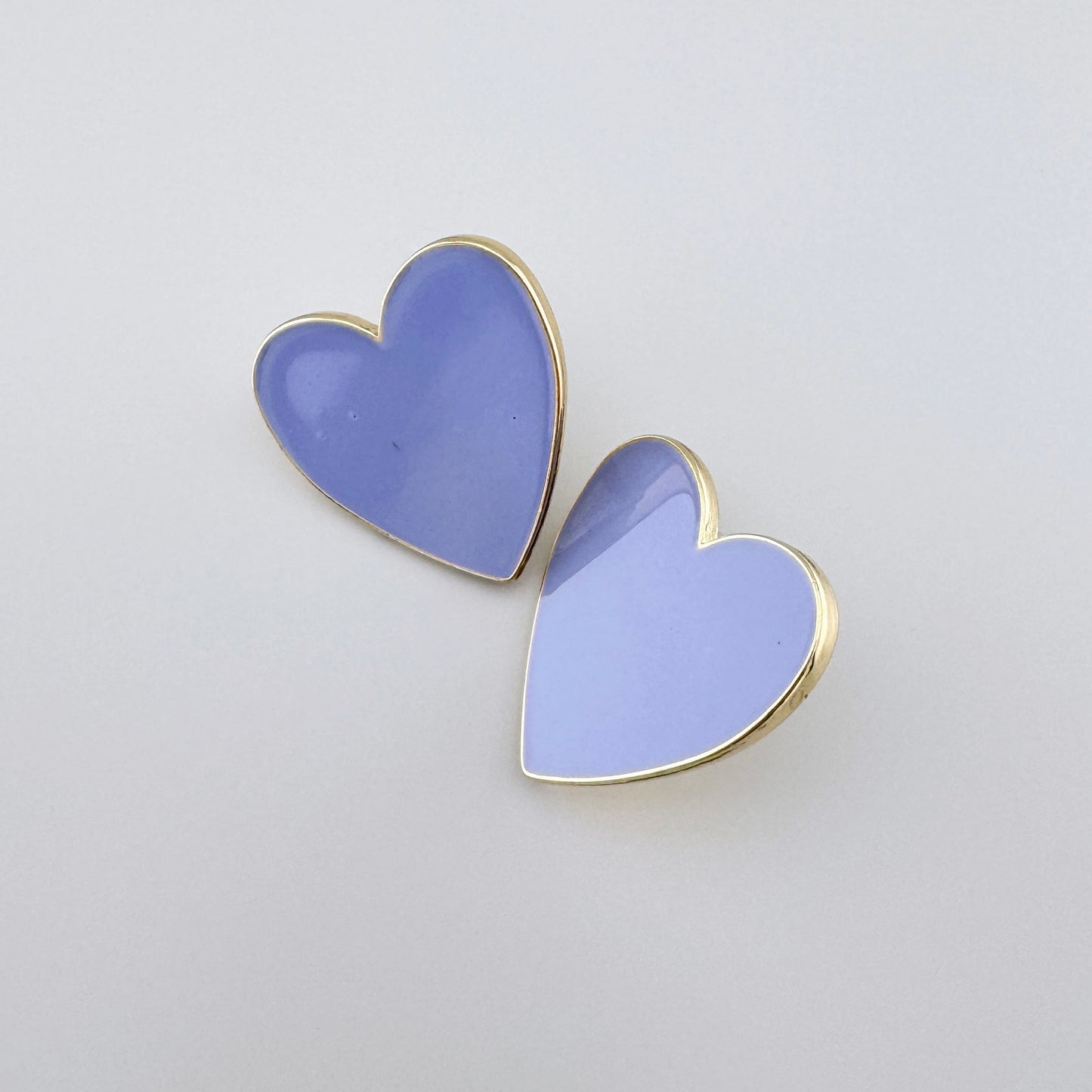 Earrings in the shape of a heart in light purple, Spanish brand Sonata.