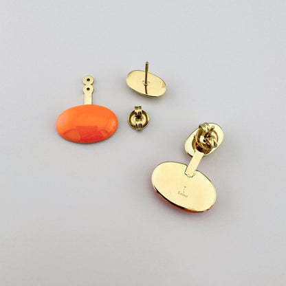 Earrings with an oval orange element and a gold-plated stud, French brand Ikita.