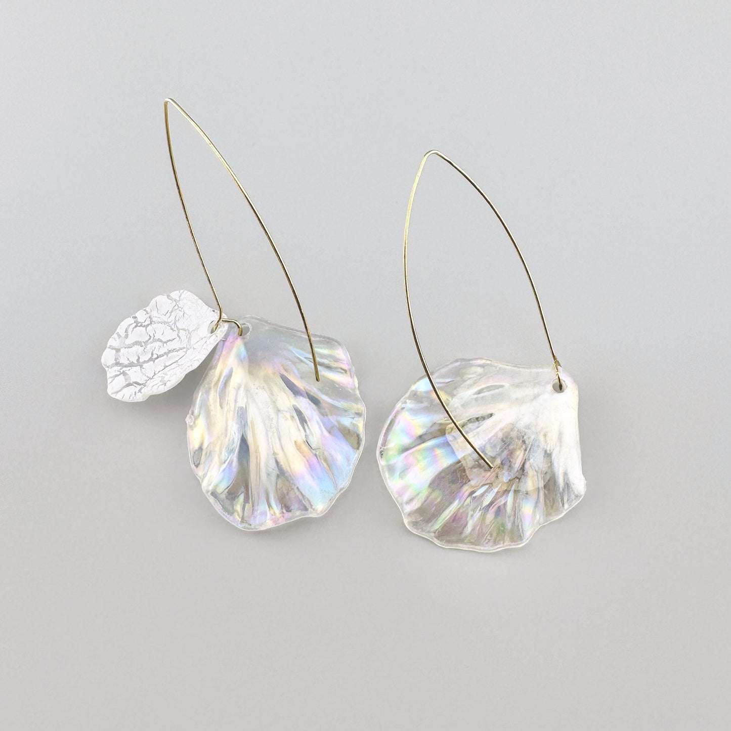 Earrings with large pendants and a cracked texture, by Spanish brand Sonata.