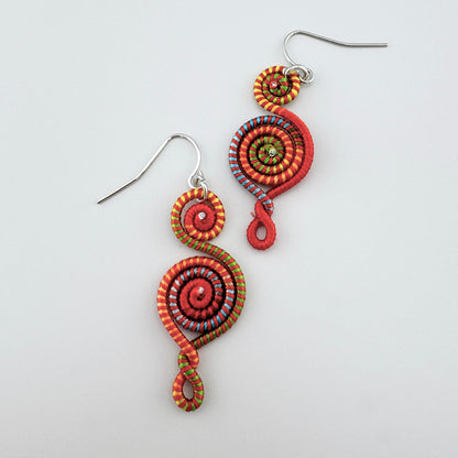 Colorful spiral earrings made from multicolored threads.