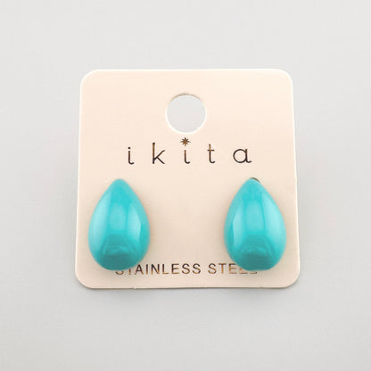 Drop-shaped earrings in a vibrant turquoise color, by French brand Ikita.