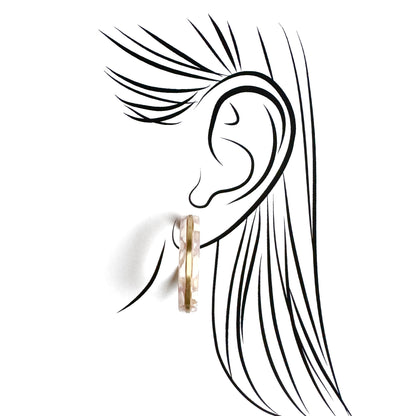Marbled acrylic hoop earrings in beige and gold tones, Danish brand Pilgrim.